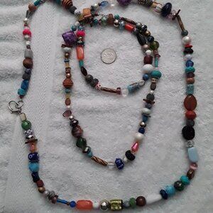 2 strand necklace. short strand is 20inche,long strand is 50 inches to wrap